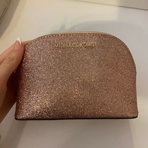 Pink glitter Michael Kors mini makeup bag